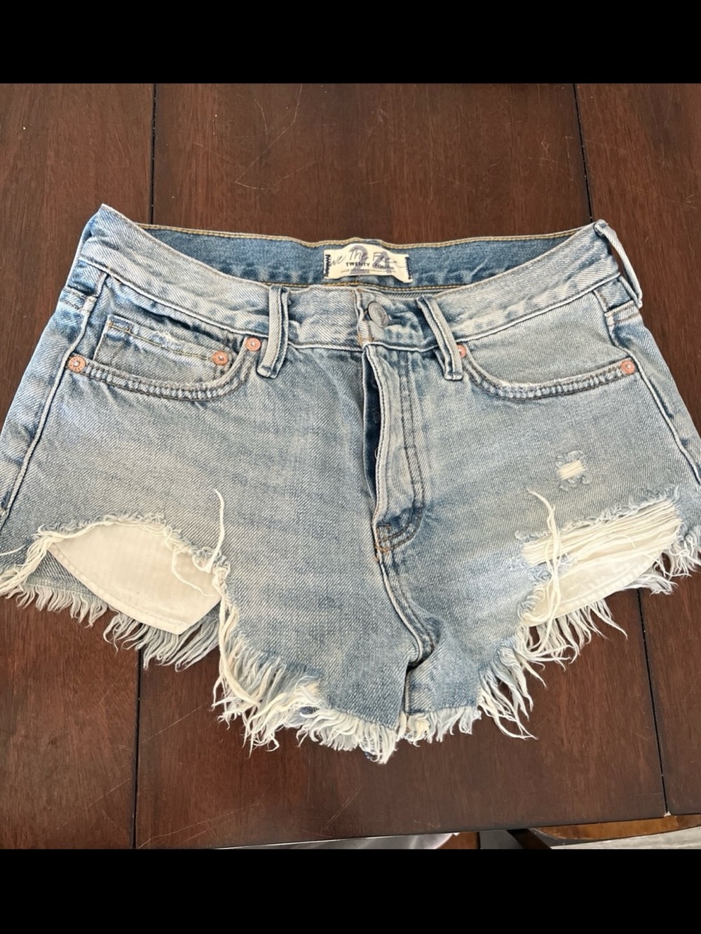 Free People Light Wash Distressed Denim Shorts